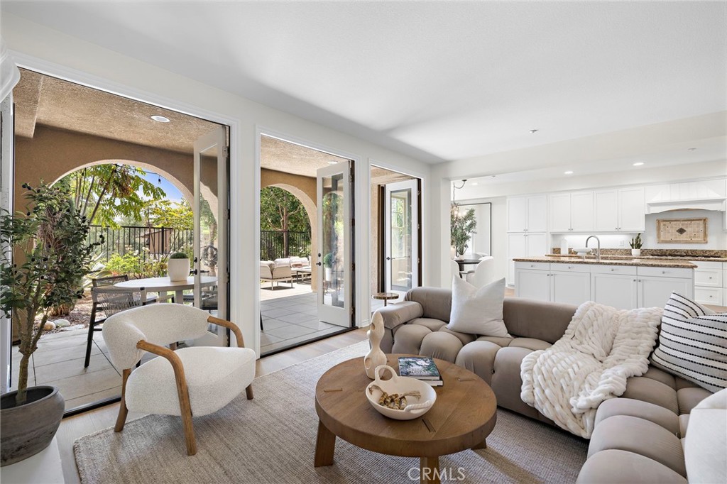 47 Tuscany Ladera Ranch, CA 92694 - Photo 6 of 28 a living room with furniture and a large window