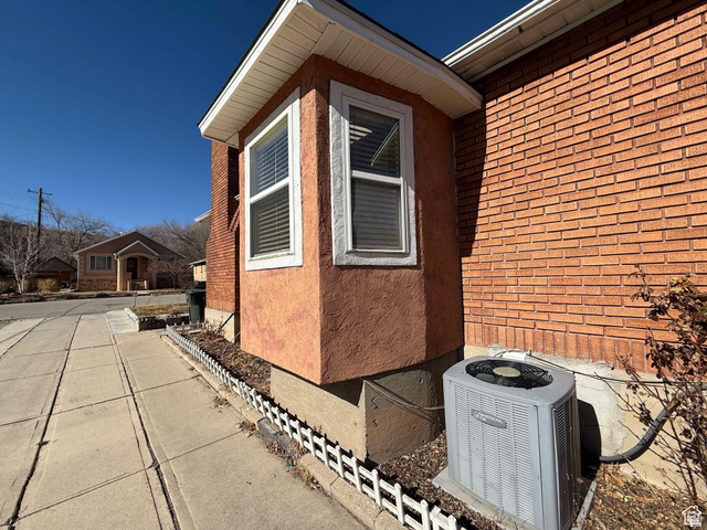 73 Garden Street Helper, UT 84526 - Photo 3 of 36 View of home's exterior with brick siding and stucco siding