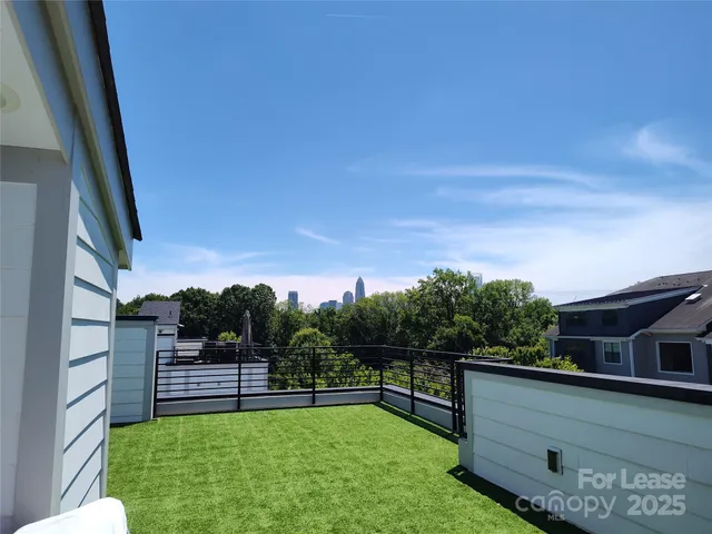 a view of a terrace with a garden