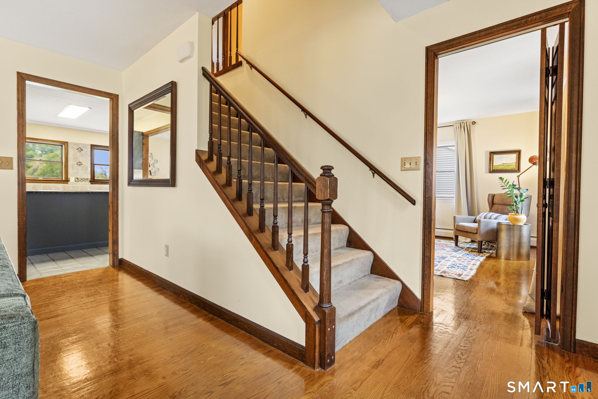 261 Brown Road Brooklyn, CT 06234 - Photo 18 of 40 Front stairs with view into playroom