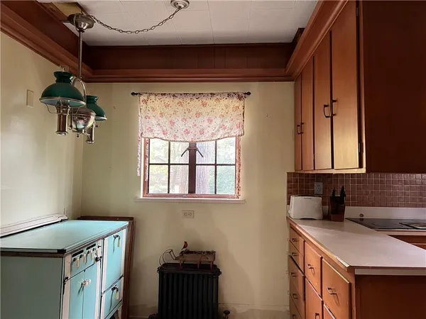 a utility room with a window