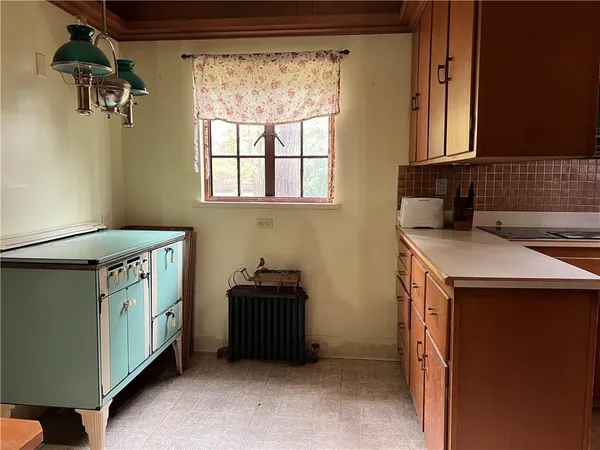 a utility room with a sink washer and dryer