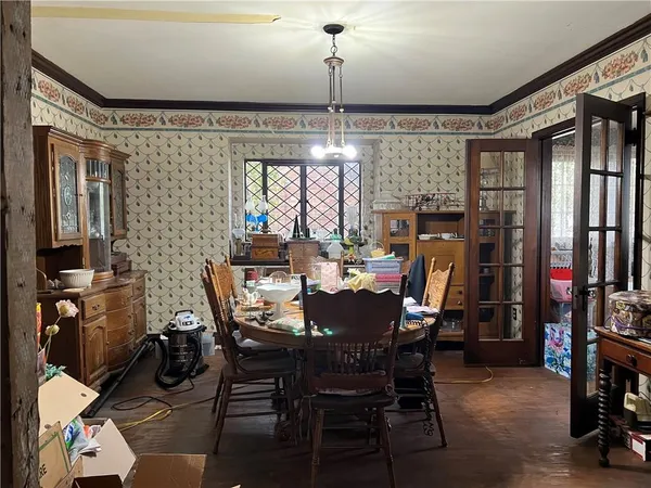 a view of a dining room with furniture window and outside view