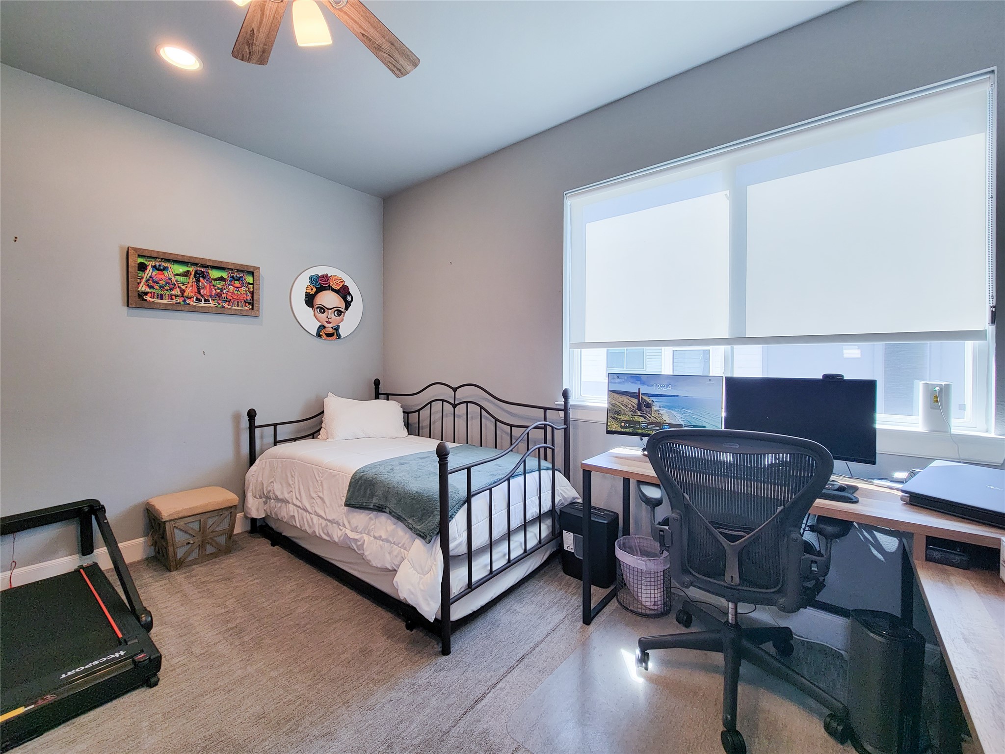 1705 Eado Point Lane Houston, TX 77003 - Photo 37 of 50 The 2nd bedroom on the 3rd floor features light walls, carpeted flooring, and a large window with blinds, providing ample natural light. Ceiling fan included and has its own private full bathroom.