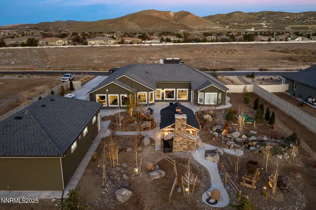 a kitchen with a stove a refrigerator and a sink