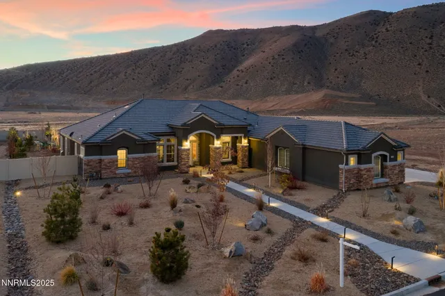 a view of a house with a ocean view