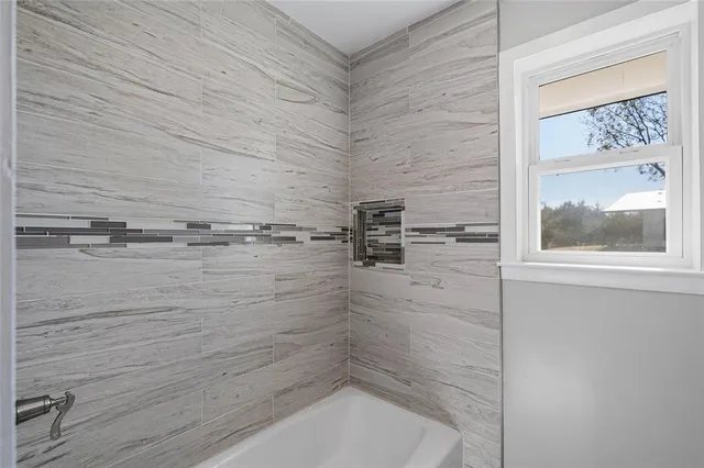 a bathroom with a bathtub