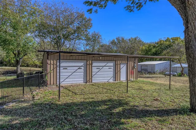 a backyard of a house with lots of green space