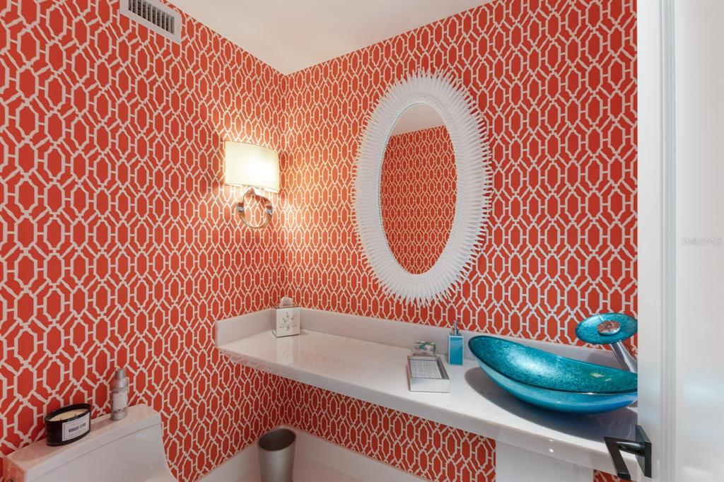 641 Boca Bay Drive Boca Grande, FL 33921 - Photo 8 of 74 a bathroom with a sink and a mirror