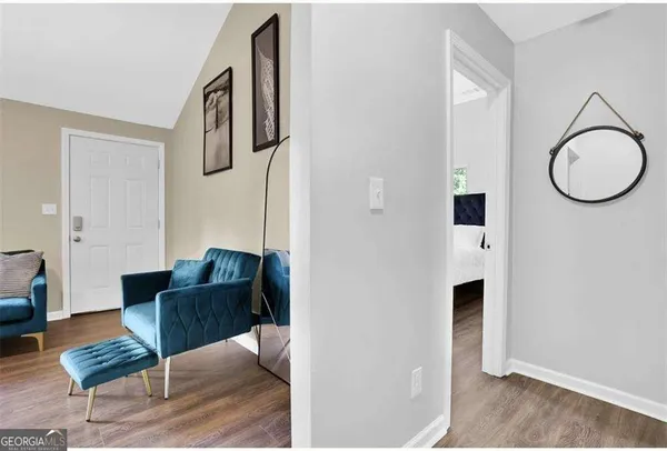 a living room with furniture and a table