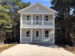 309 Grande Pointe Circle Inlet Beach, FL 32461 - Photo 1 of 9 a front view of a house with a yard