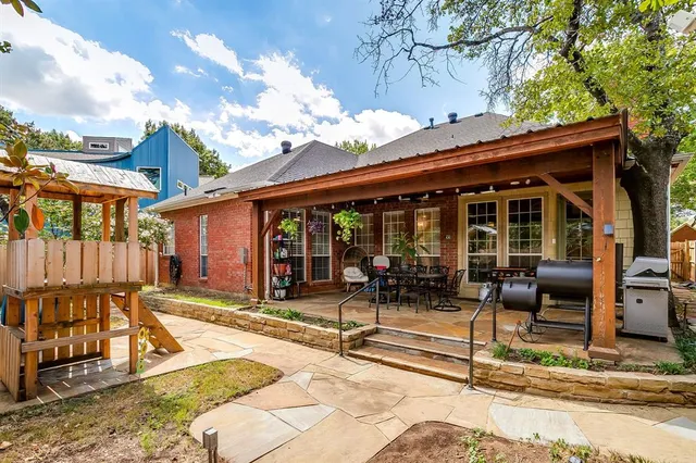a view of a house with sitting area and furniture