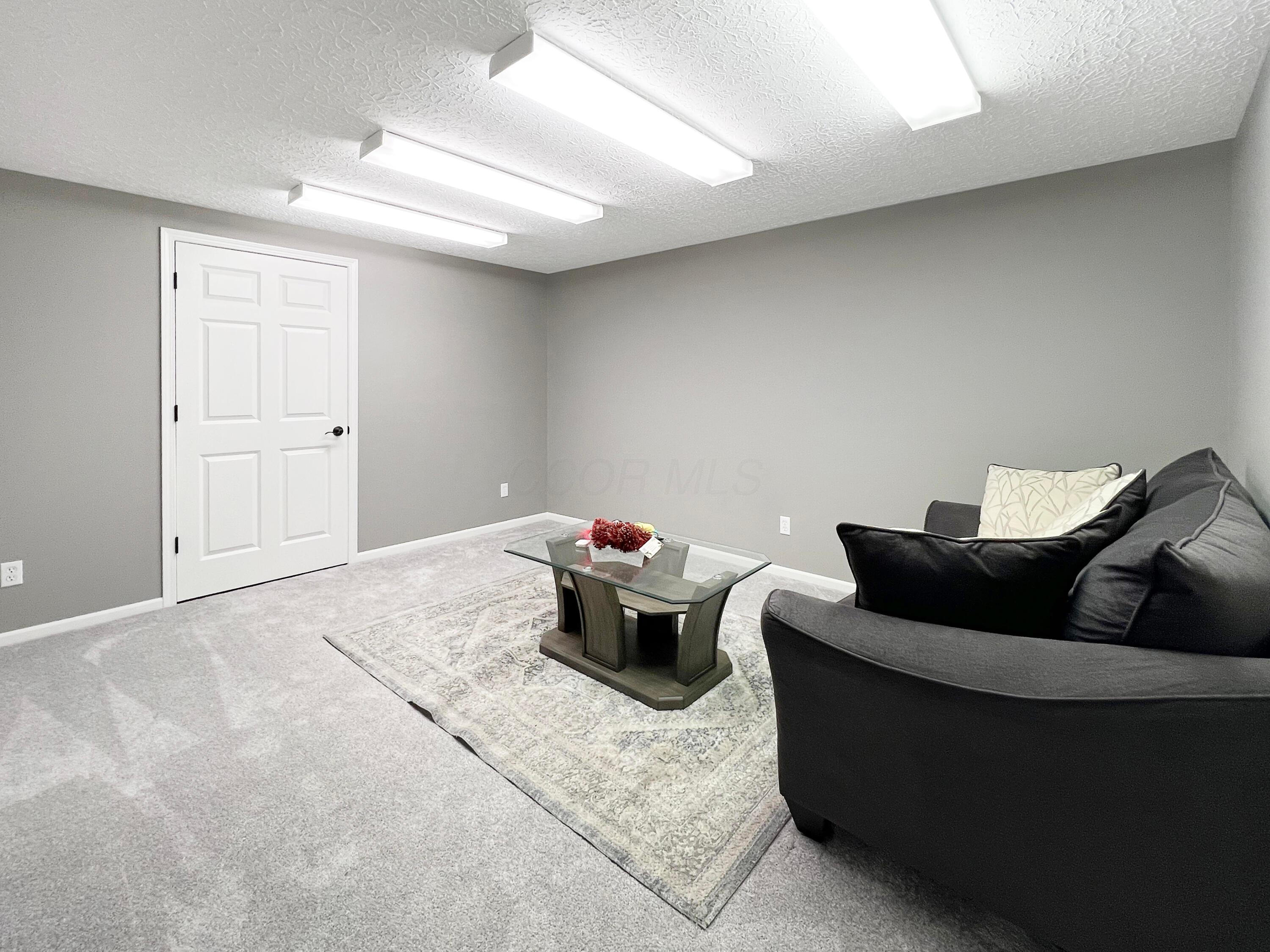 7792 Rodebaugh Road Reynoldsburg, OH 43068 - Photo 32 of 53 Finished Basement