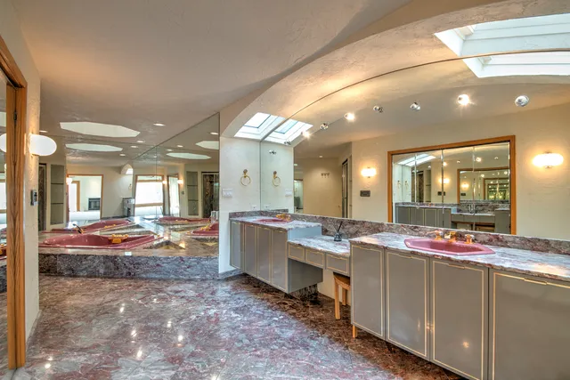 a bathroom with a shower and a toilet