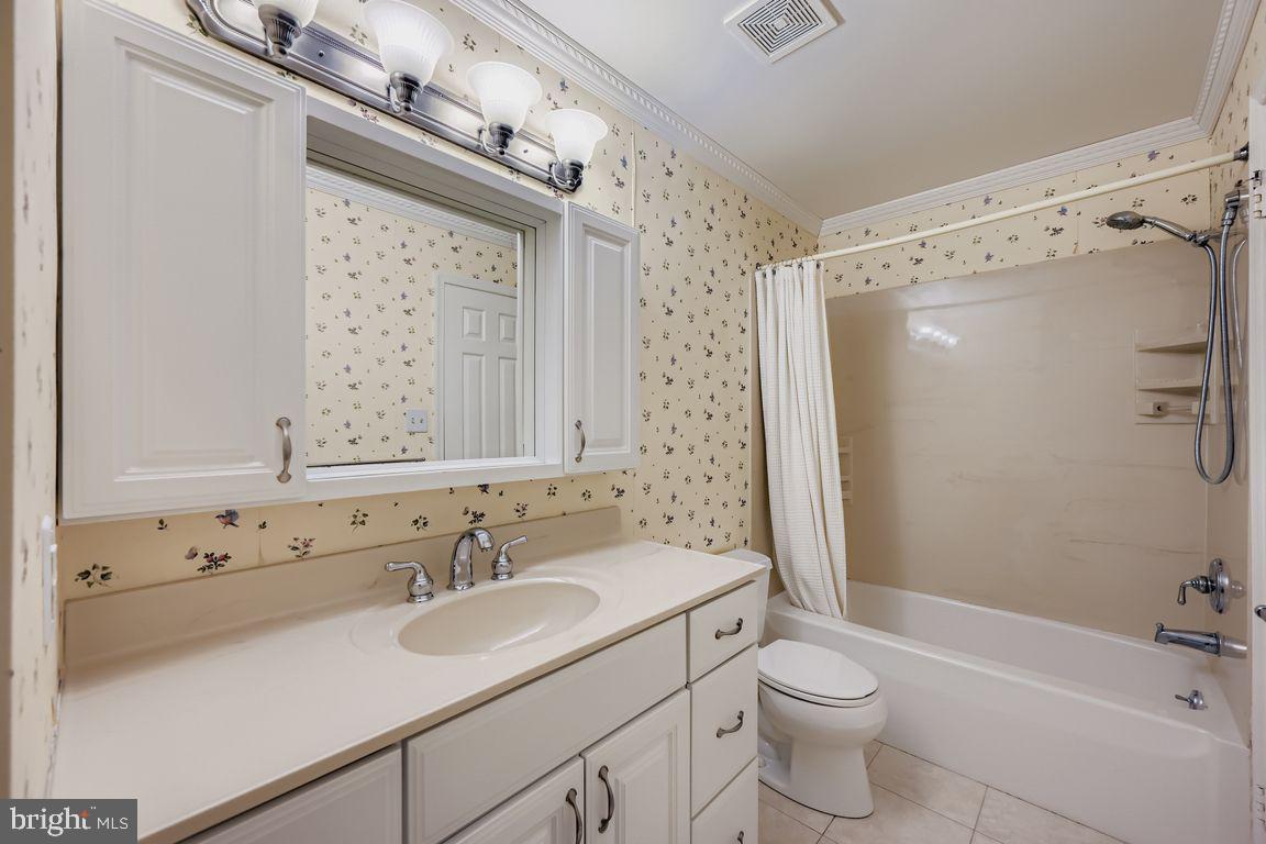 9 Bridgeview Court Baltimore, MD 21236 - Photo 14 of 27 a bathroom with a sink toilet tub and shower