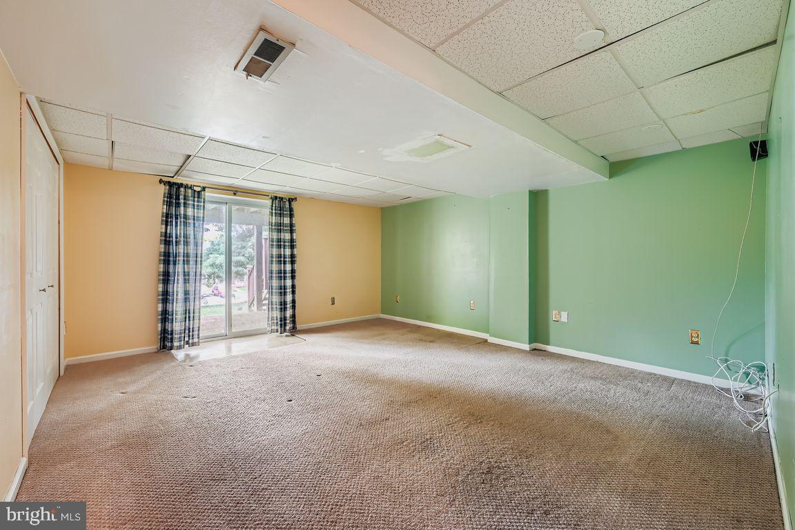 9 Bridgeview Court Baltimore, MD 21236 - Photo 18 of 27 a view of an empty room with a window