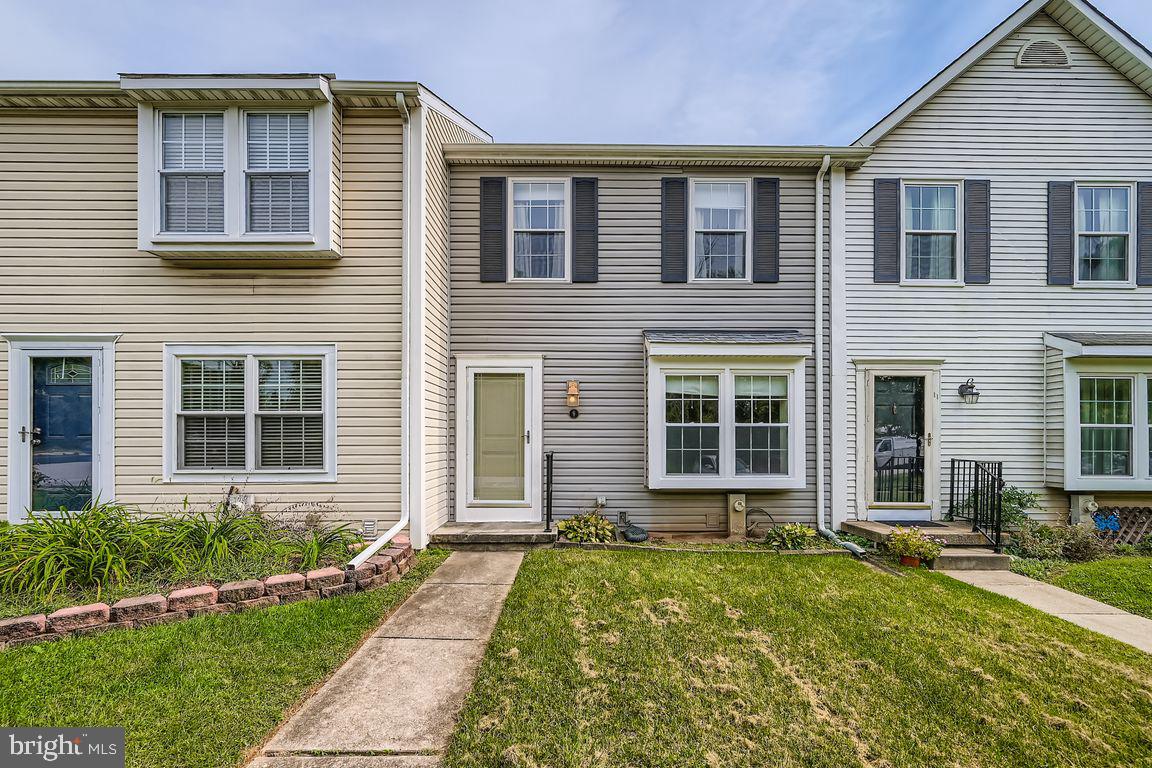 9 Bridgeview Court Baltimore, MD 21236 - Photo 2 of 27 a front view of a house with garden