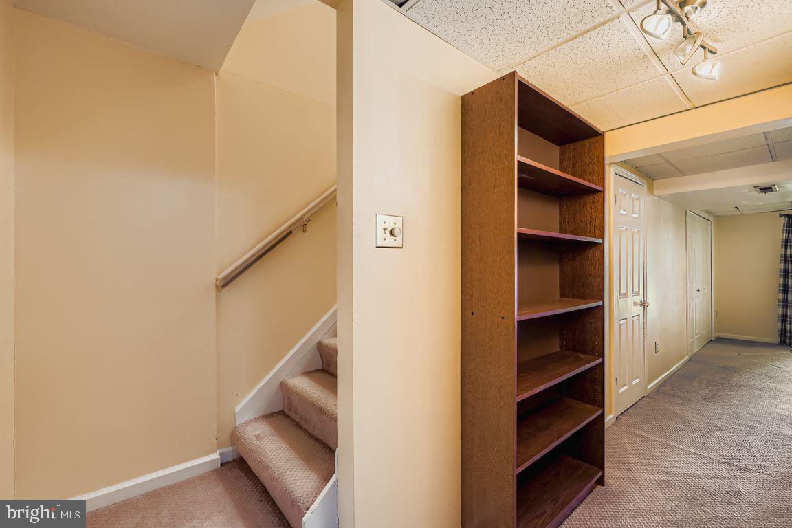 9 Bridgeview Court Baltimore, MD 21236 - Photo 22 of 27 a view of walk in closet with empty racks
