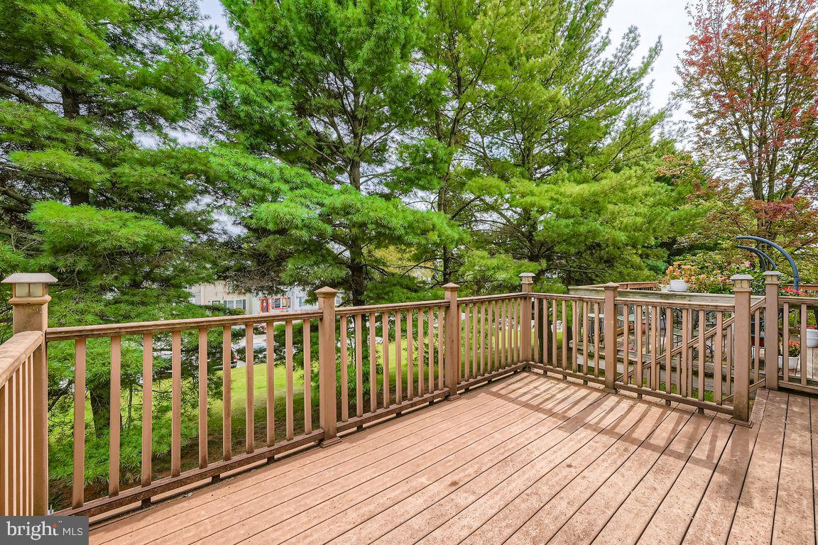 9 Bridgeview Court Baltimore, MD 21236 - Photo 23 of 27 a view of balcony with wooden floor and fence