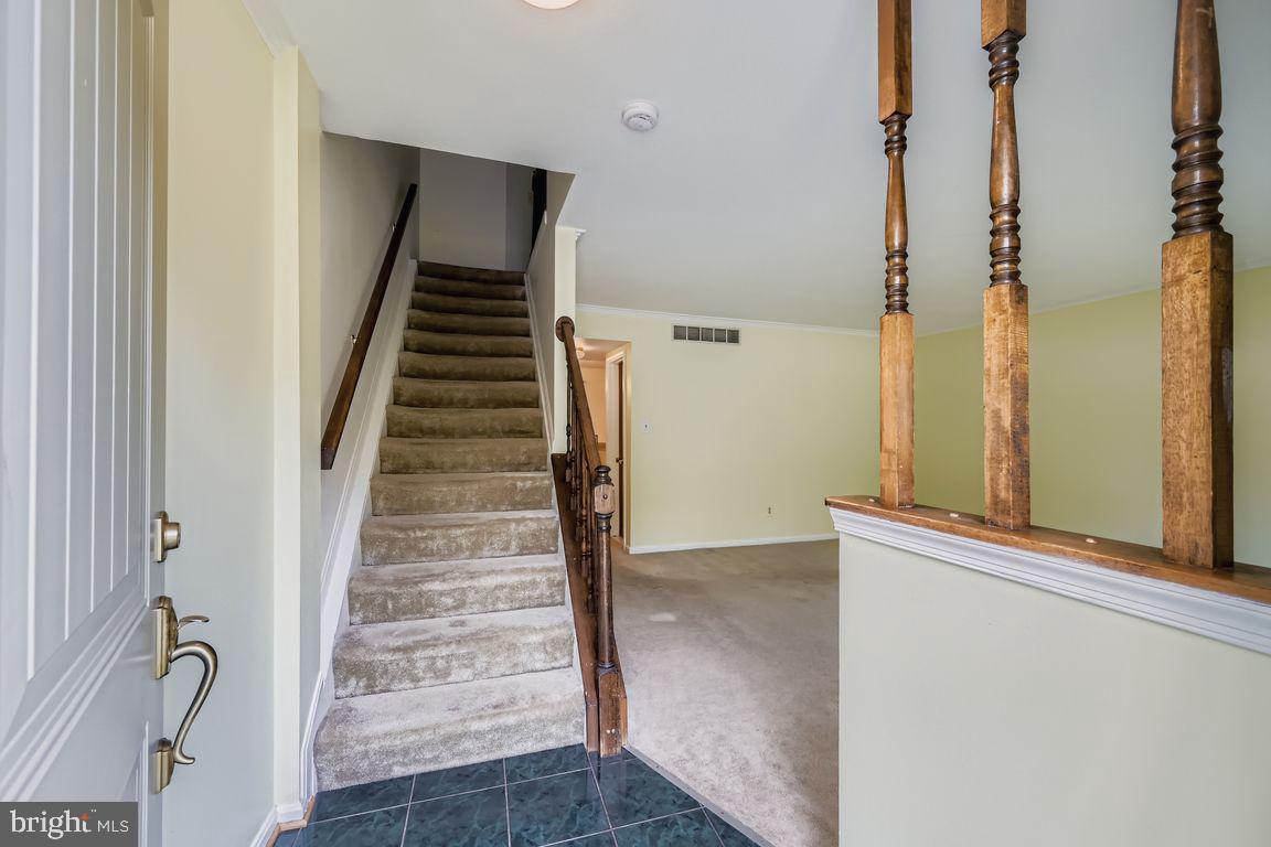 9 Bridgeview Court Baltimore, MD 21236 - Photo 3 of 27 a view of a hallway with stairs