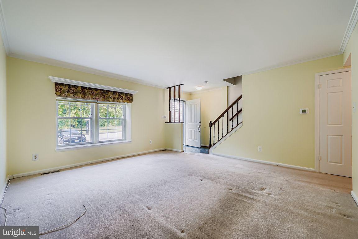 9 Bridgeview Court Baltimore, MD 21236 - Photo 4 of 27 a view of an empty room with a window