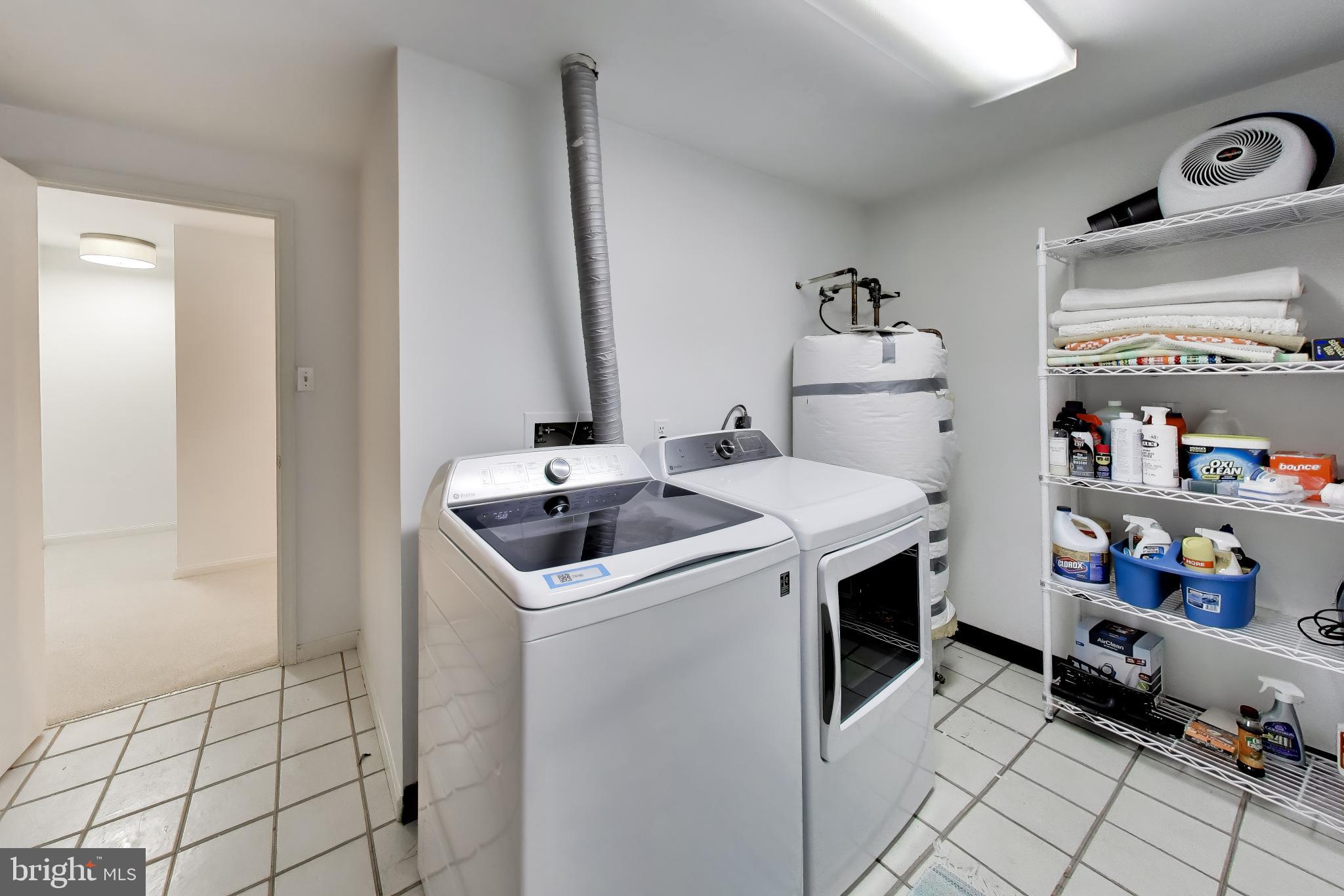 6727 Fairfax Road, Unit 13 Chevy Chase, MD 20815 - Photo 30 of 44 Laundry room with newer washer/dryer