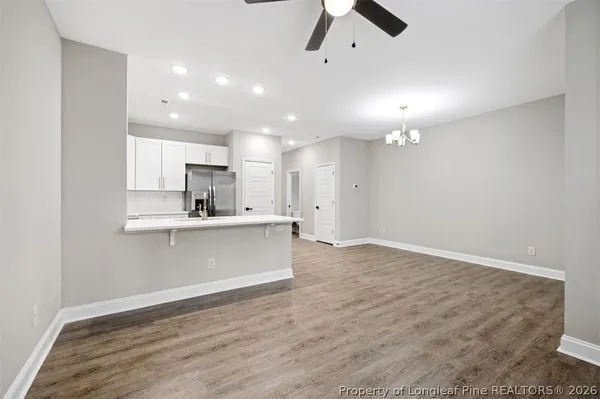 a view of kitchen with wooden floor