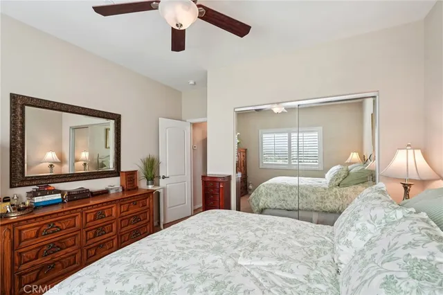 a view of a patio with table and chairs and potted plants