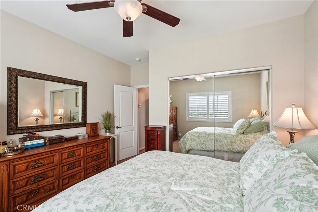 36274 Waxen Road Lake Elsinore, CA 92532 - Photo 31 of 65 a bedroom with a bed and a flat screen tv