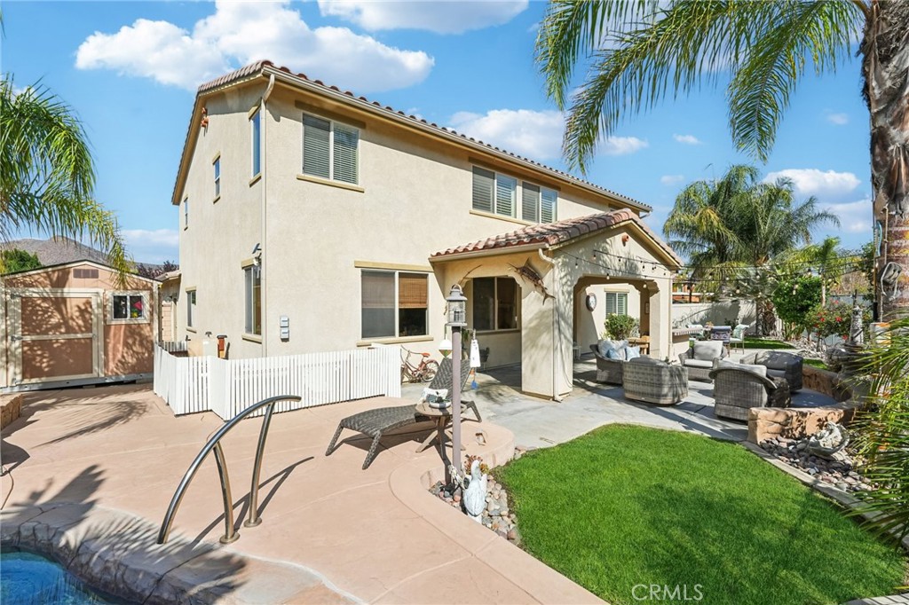 36274 Waxen Road Lake Elsinore, CA 92532 - Photo 39 of 65 a view of a house with backyard and sitting area