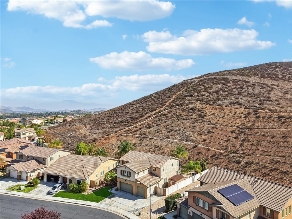 36274 Waxen Road Lake Elsinore, CA 92532 - Photo 44 of 65 an aerial view of residential houses with outdoor space