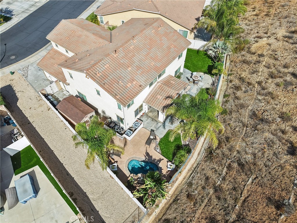 36274 Waxen Road Lake Elsinore, CA 92532 - Photo 50 of 65 an aerial view of a house with a yard and covered with trees
