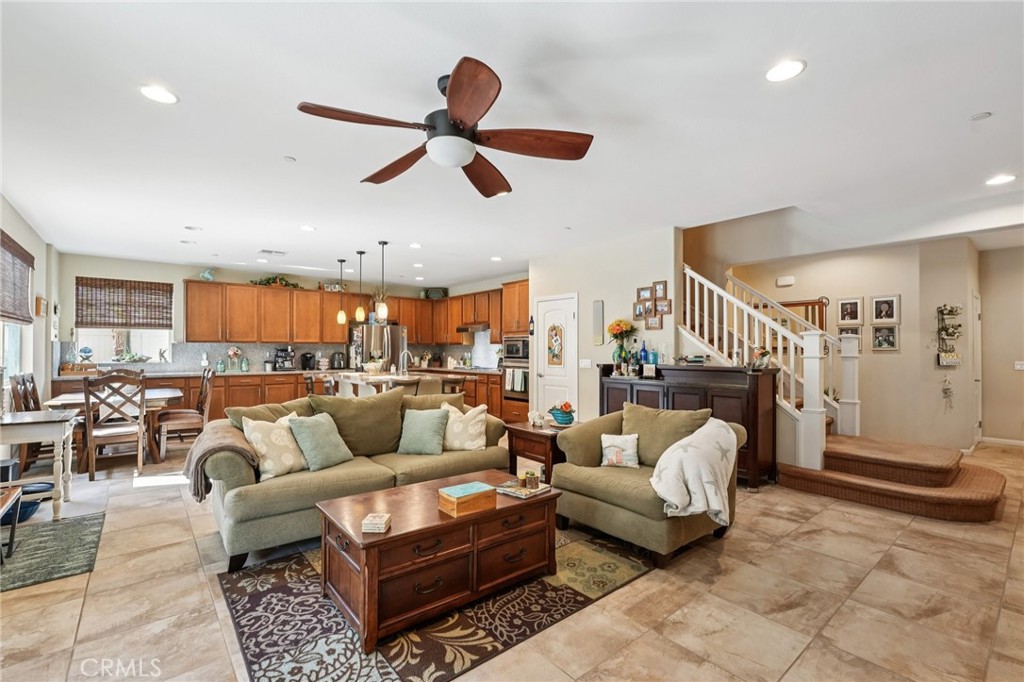 36274 Waxen Road Lake Elsinore, CA 92532 - Photo 8 of 65 a living room with furniture and a ceiling fan