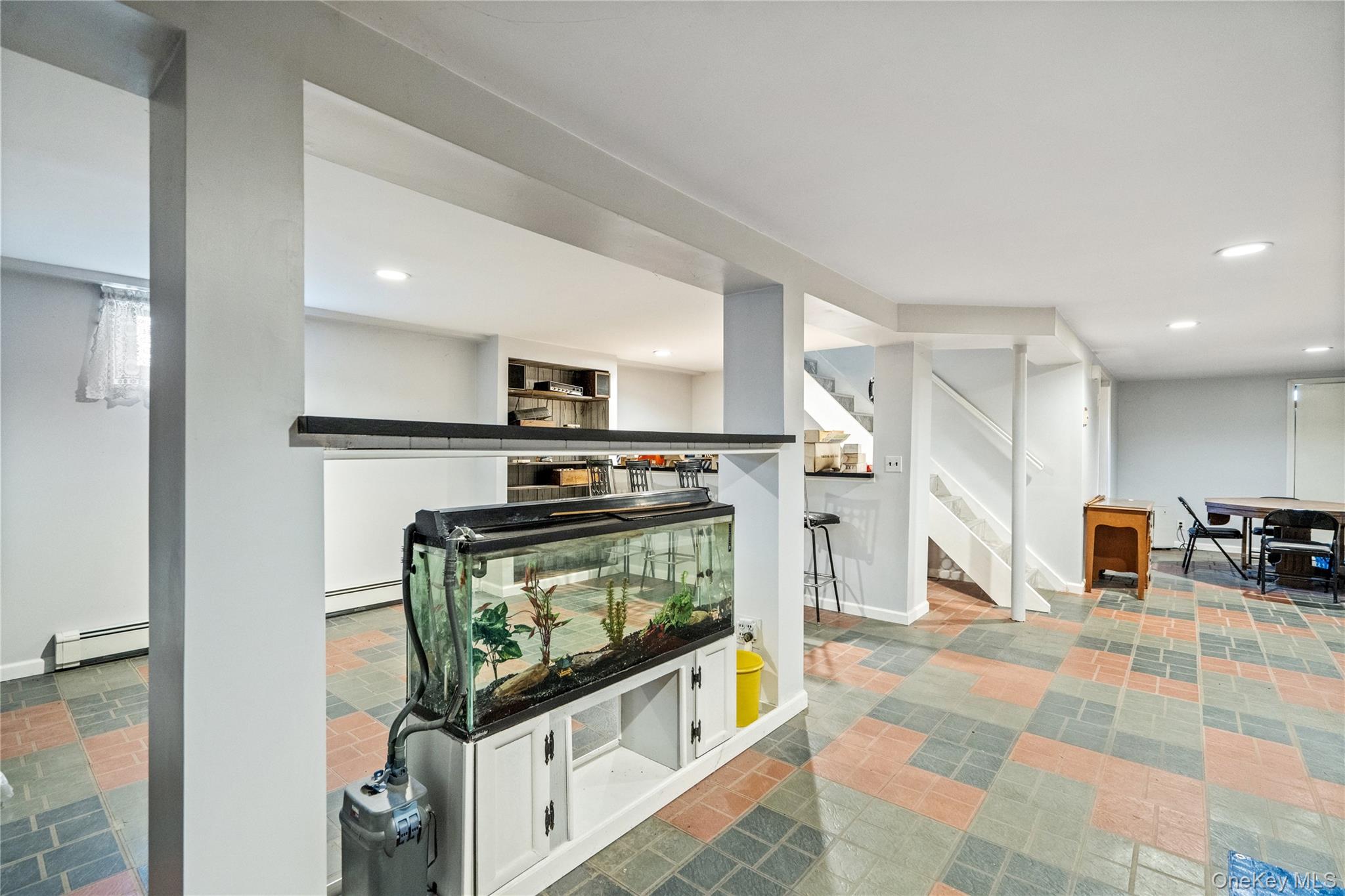211 Mooney Pond Road Selden, NY 11784 - Photo 29 of 41 a kitchen with stainless steel appliances granite countertop a stove a sink and a refrigerator