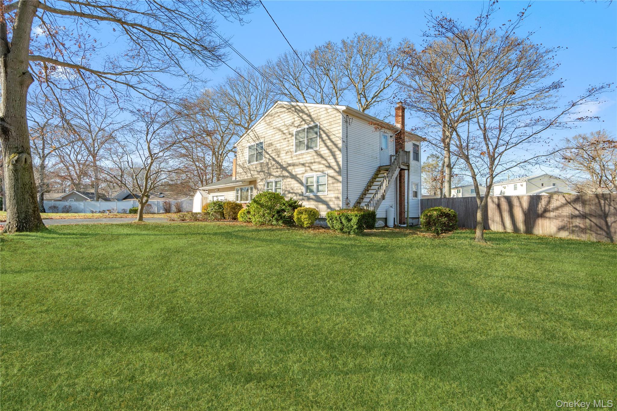 211 Mooney Pond Road Selden, NY 11784 - Photo 3 of 41 a view of a volley ball court
