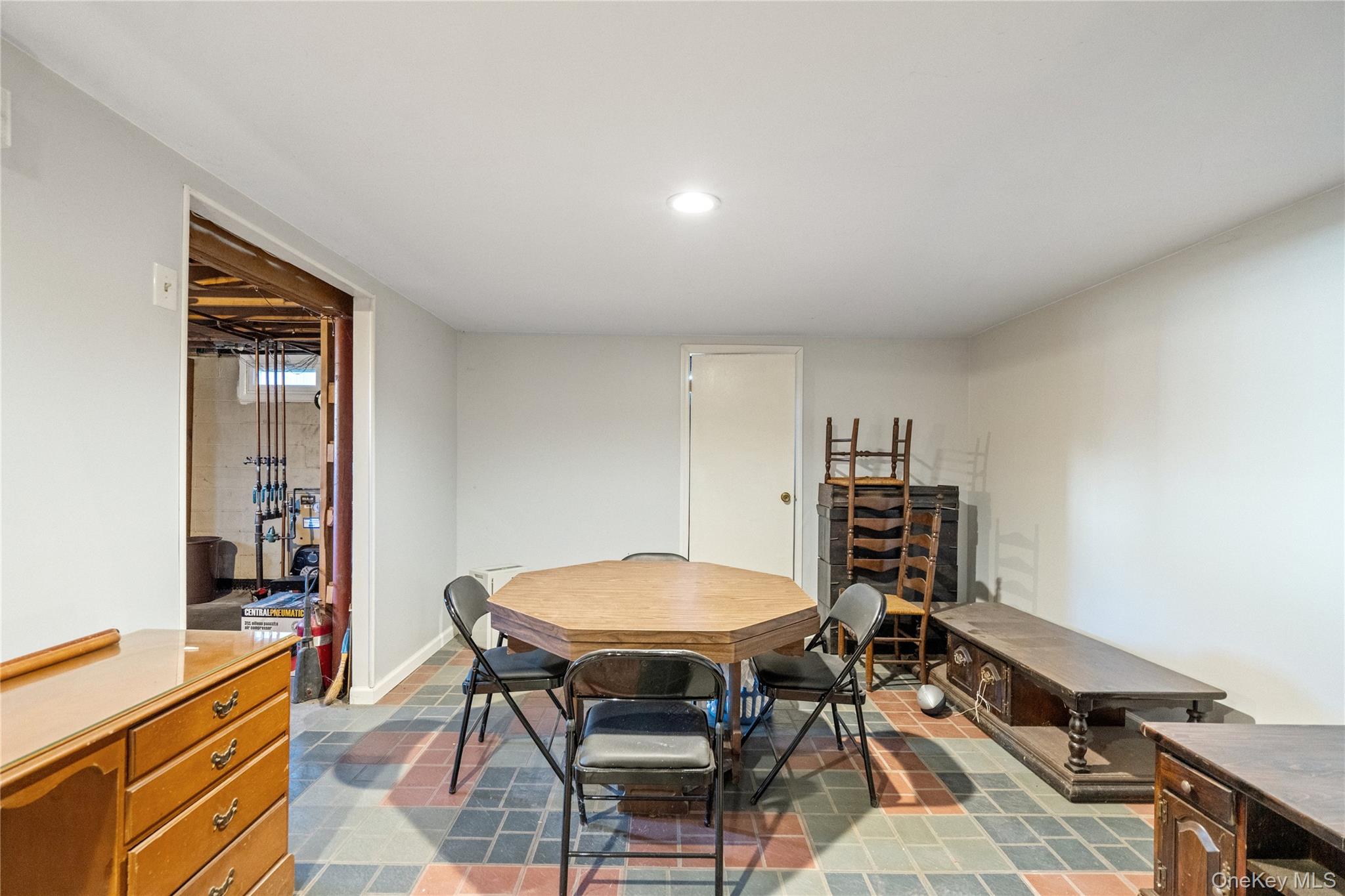 211 Mooney Pond Road Selden, NY 11784 - Photo 31 of 41 a view of a workspace with furniture