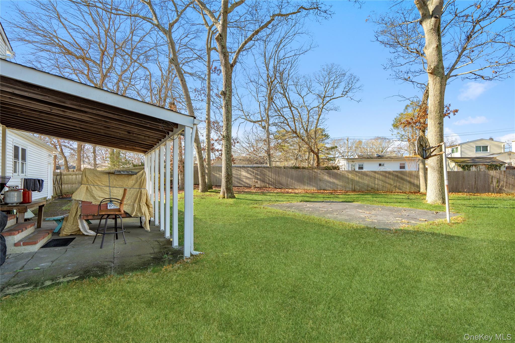 211 Mooney Pond Road Selden, NY 11784 - Photo 34 of 41 a view of yard with patio