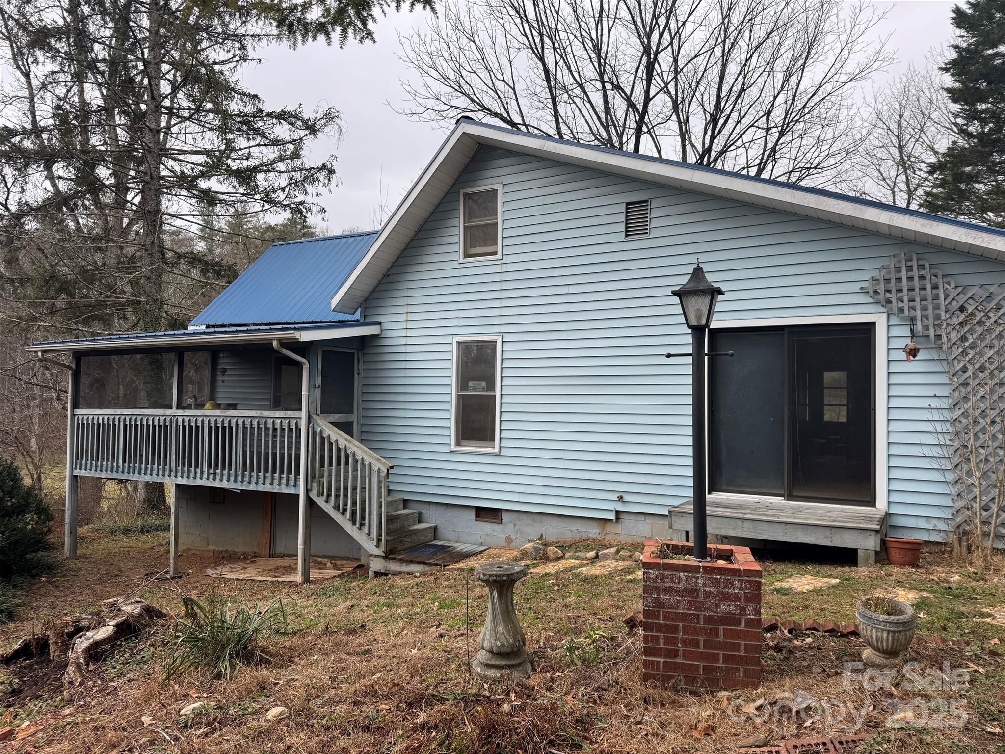 a front view of a house with stairs