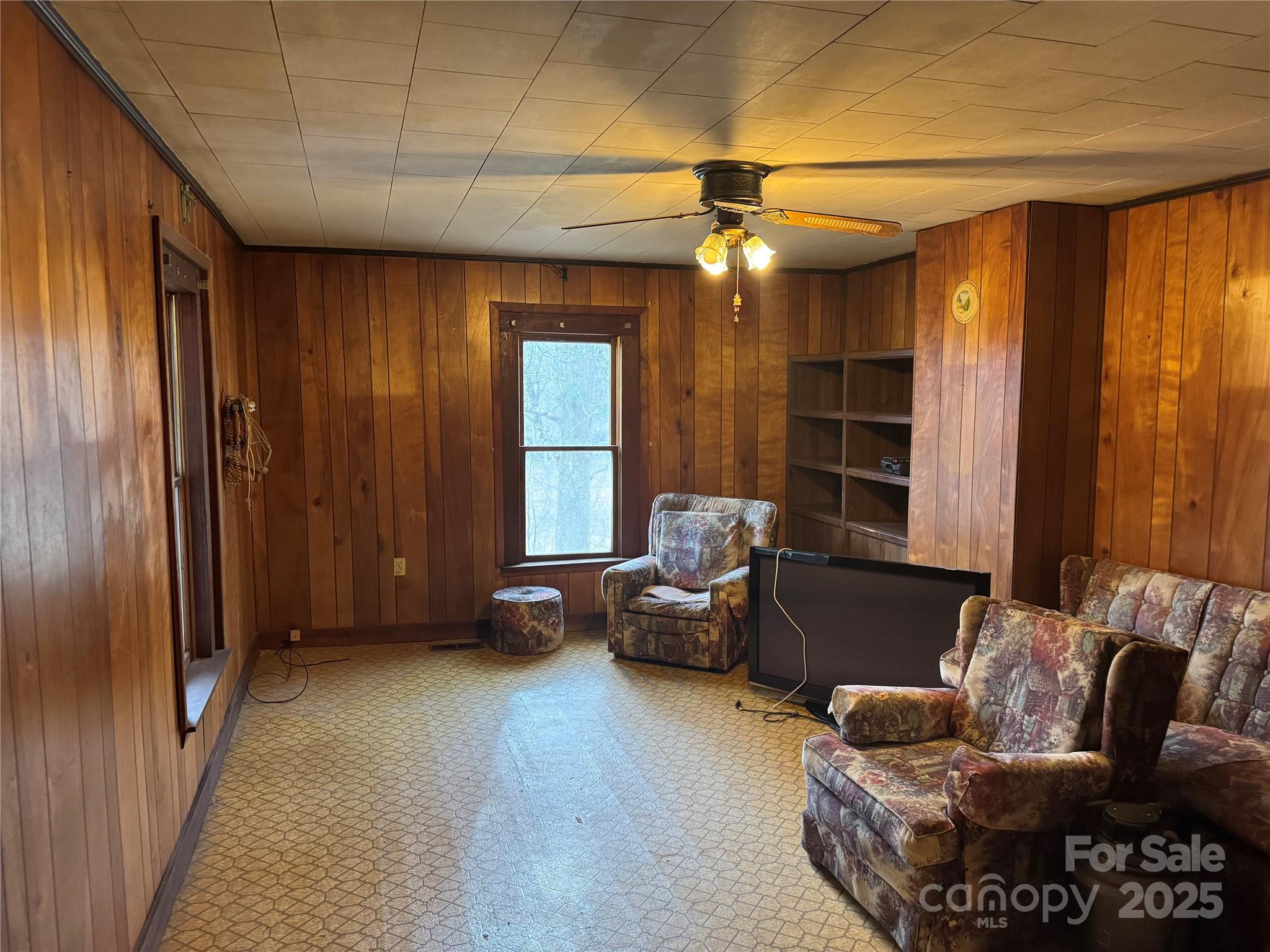 201 Tinsley Road Brevard, NC 28712 - Photo 11 of 23 a living room with furniture and a chandelier