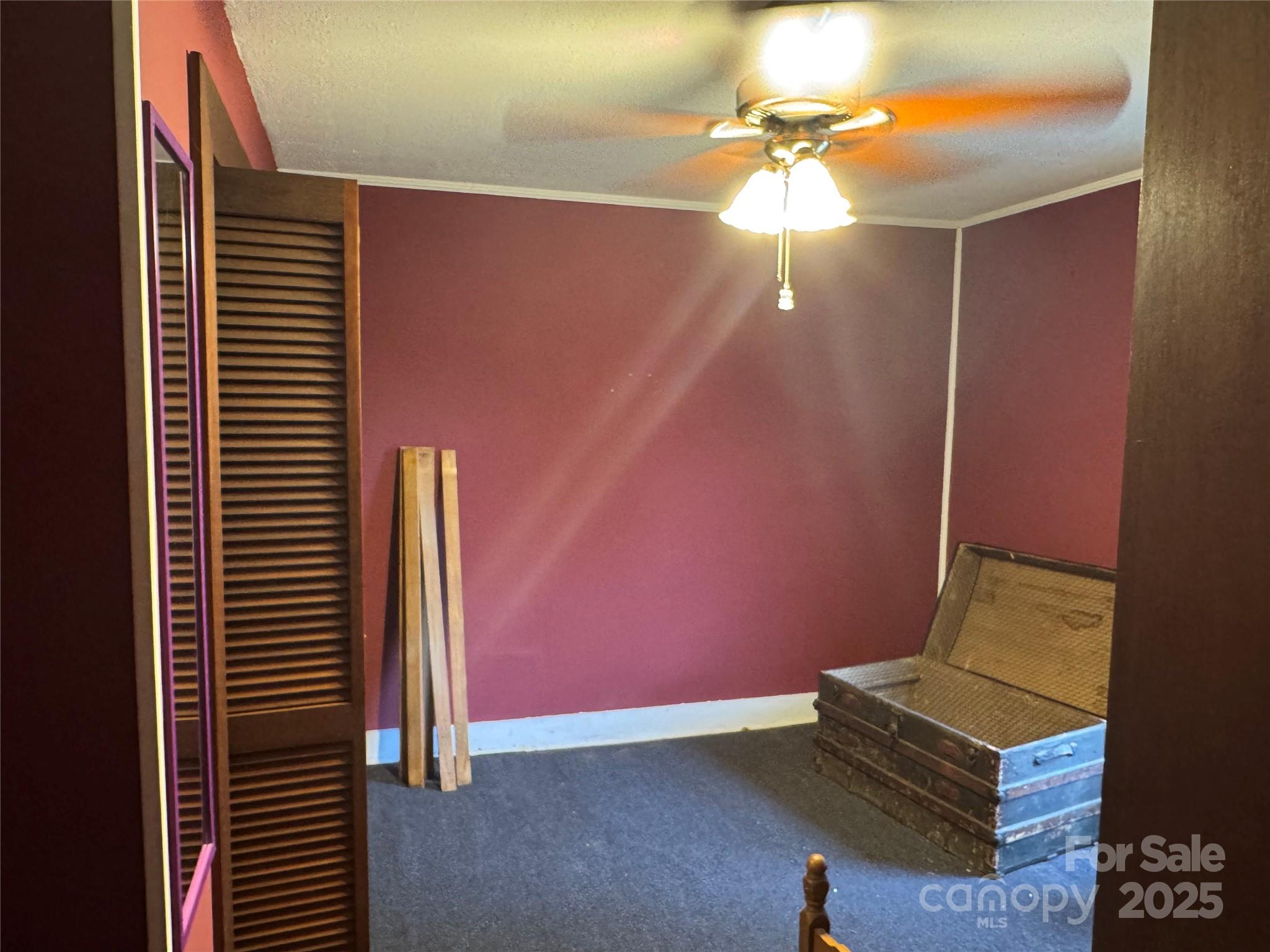 201 Tinsley Road Brevard, NC 28712 - Photo 12 of 23 a view of a room with gym equipment and a fan