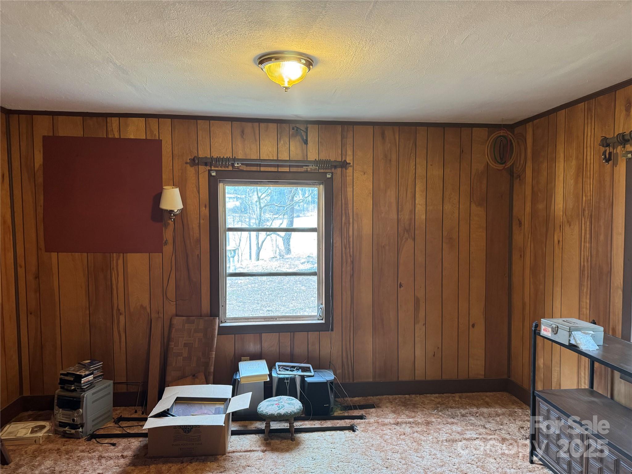 201 Tinsley Road Brevard, NC 28712 - Photo 20 of 23 a room with furniture and window