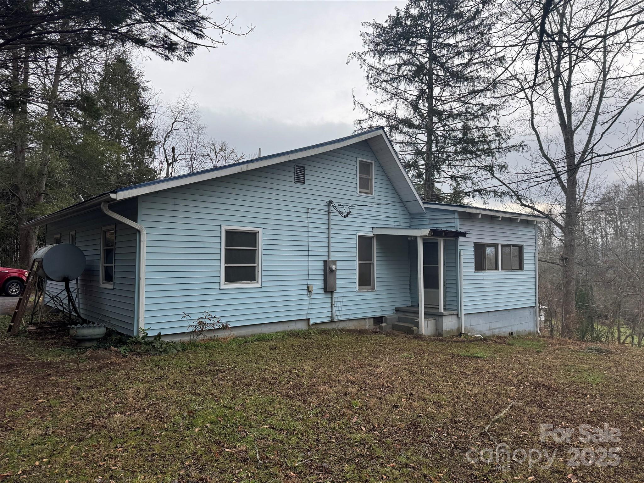 201 Tinsley Road Brevard, NC 28712 - Photo 3 of 23 a view of house with backyard space and garden