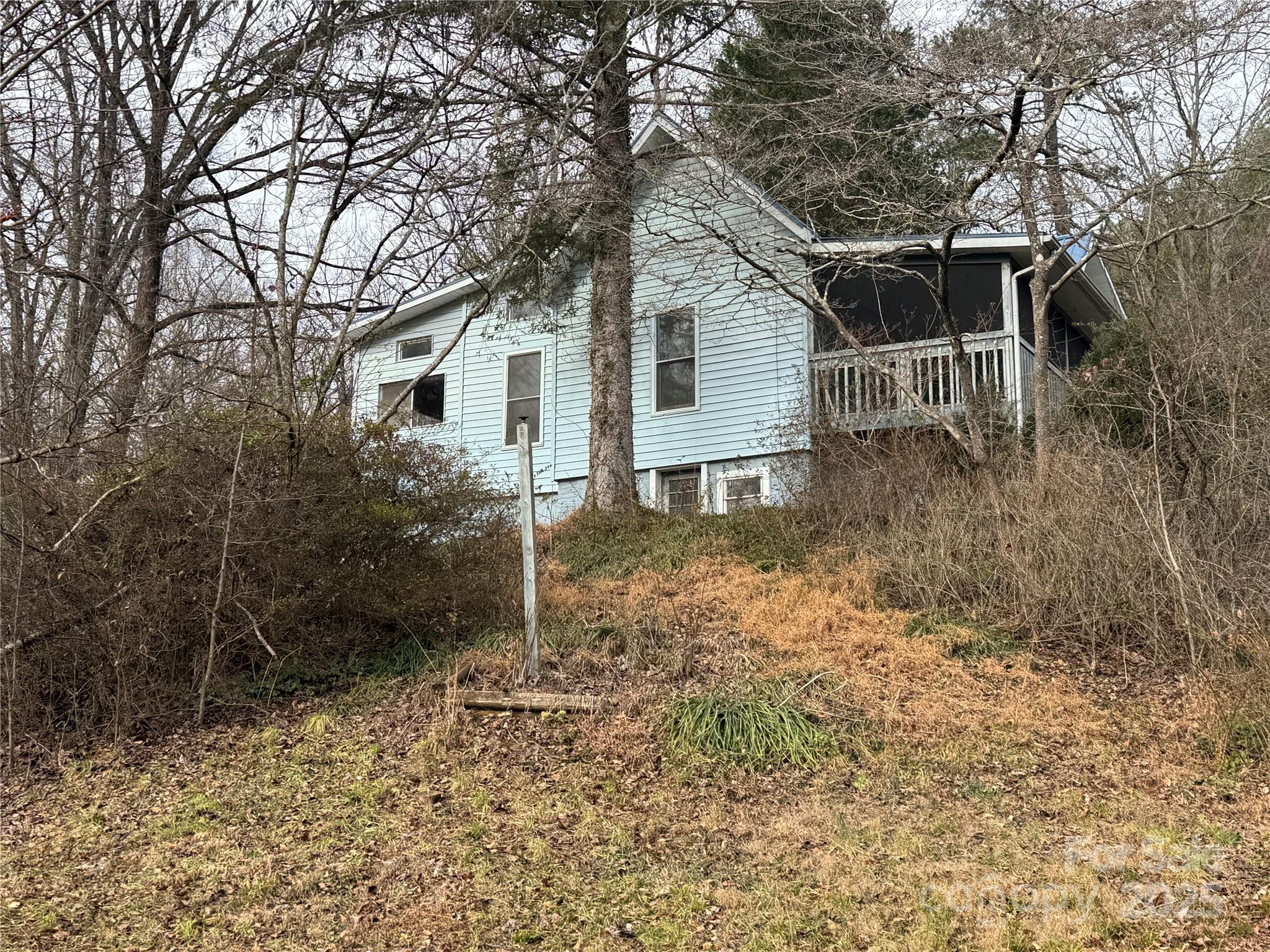 201 Tinsley Road Brevard, NC 28712 - Photo 5 of 23 a front view of a house with garden