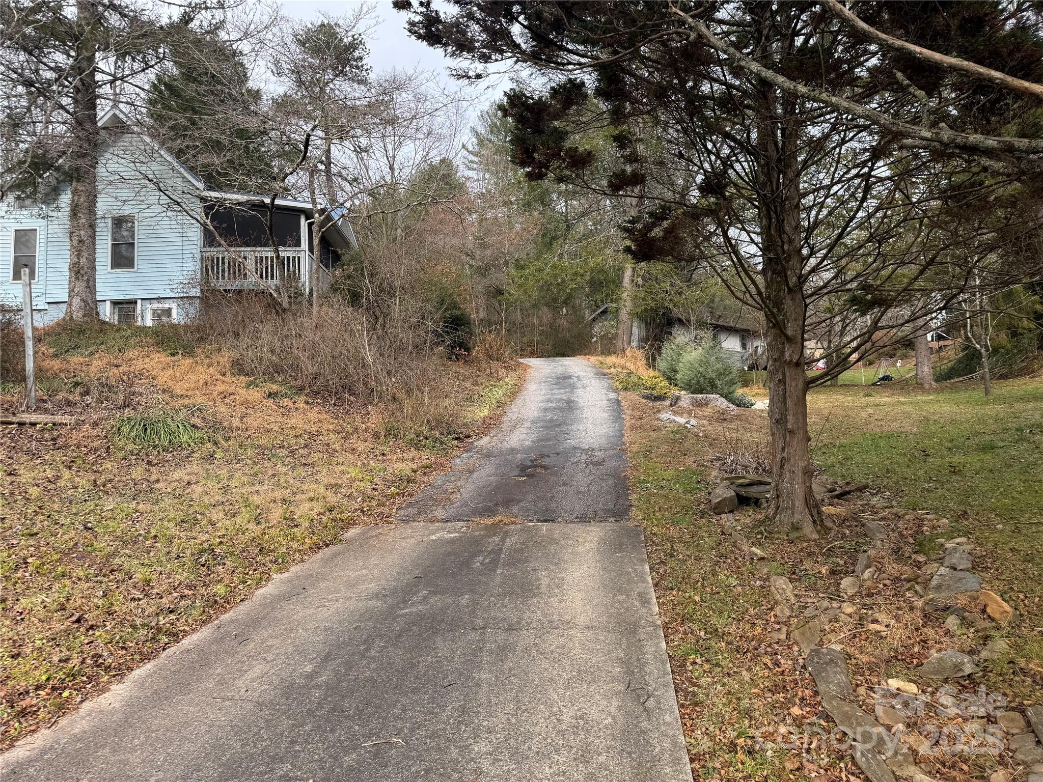 201 Tinsley Road Brevard, NC 28712 - Photo 6 of 23 a view of a house with a yard