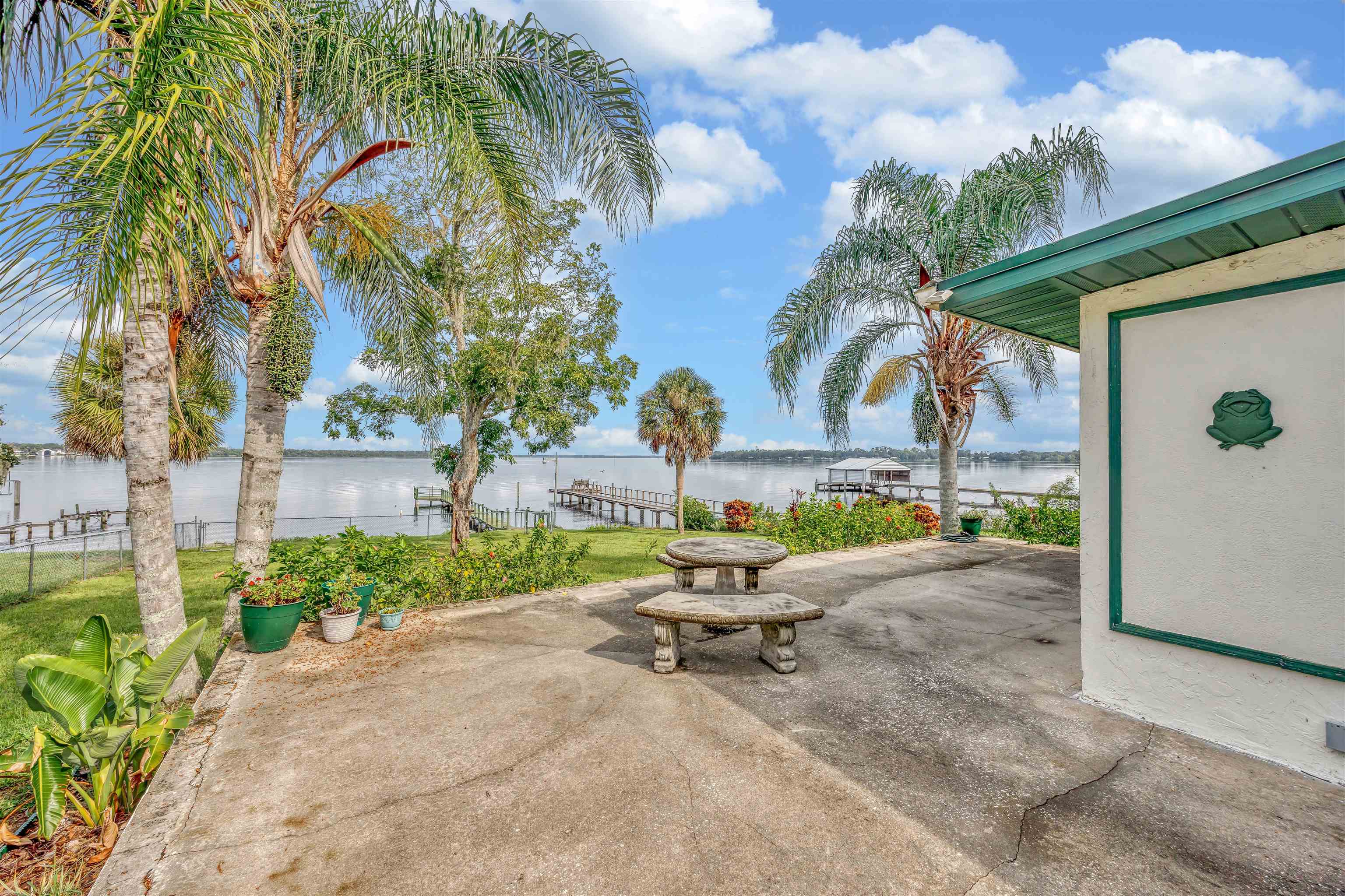 115 Sunset Point Road East Palatka, FL 32131 - Photo 17 of 67 View of patio with a water view