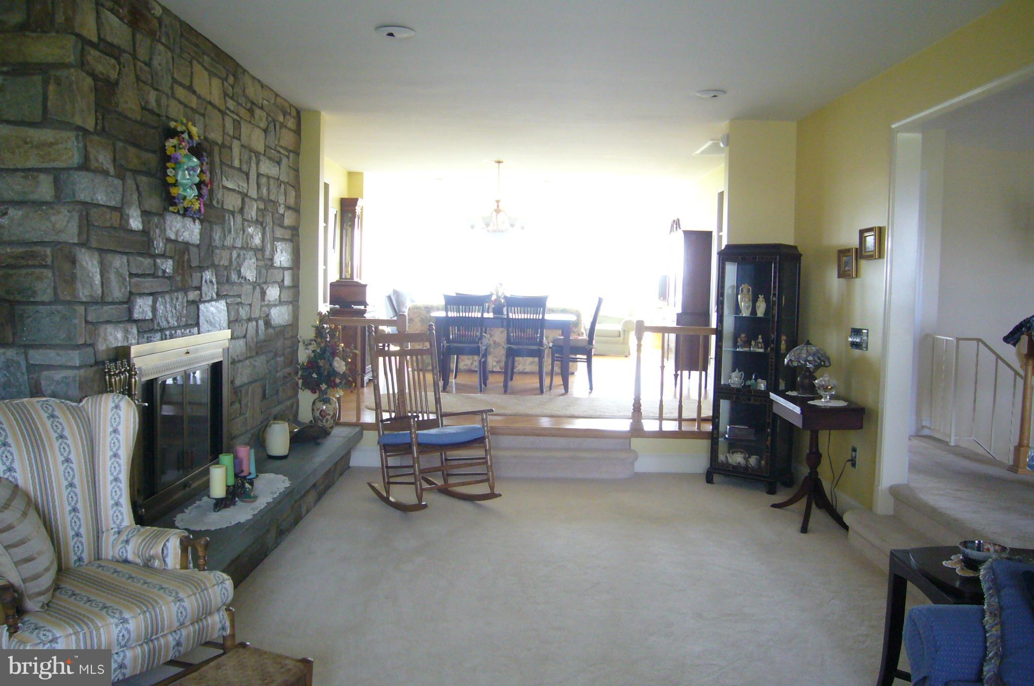 24001 Old Hundred Road Dickerson, MD 20842 - Photo 11 of 30 Living Room with stone fireplace