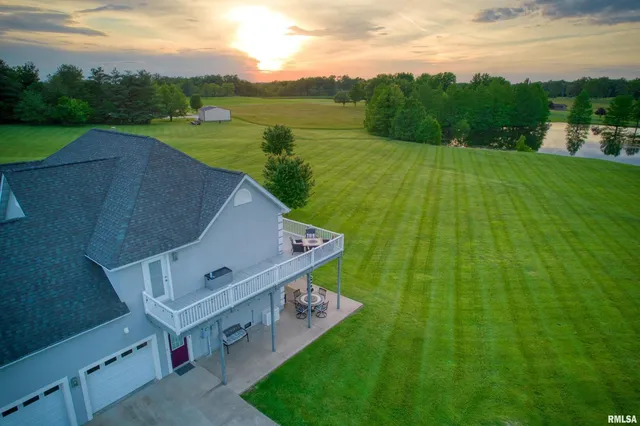 a view of a house with a big yard