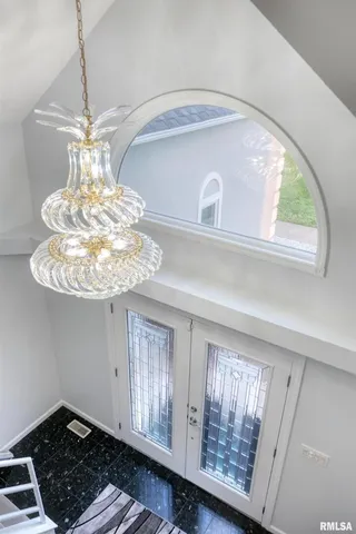 a view of a chandelier in a room