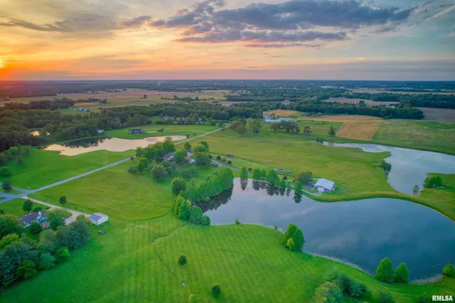 a view of a lake with a big yard