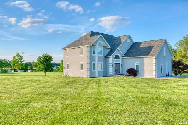 a house view with a garden space